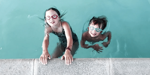 When should kids wear swim ear plugs?